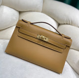 Elegant Pochette Handbag in Smooth Gold Finish