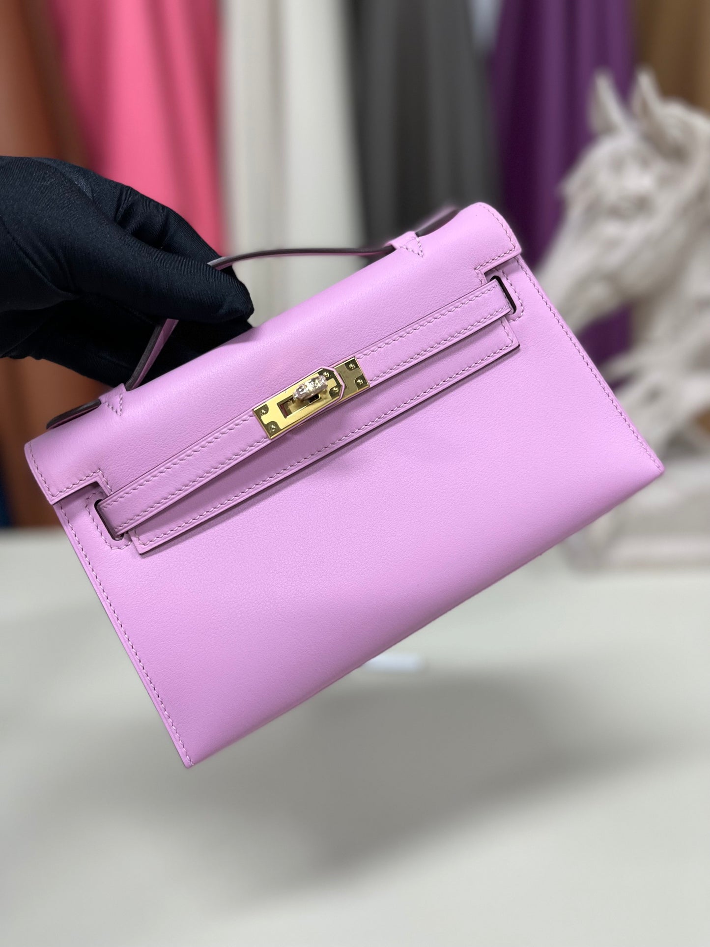 Elegant Pochette Handbag in Smooth Gold Finish