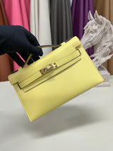 Elegant Pochette Handbag in Smooth Gold Finish