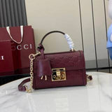 Structured Small Top Handle Bag with Padlock Closure