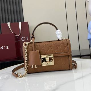 Structured Small Top Handle Bag with Padlock Closure
