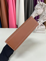 Elegant Pochette Handbag in Smooth Gold Finish