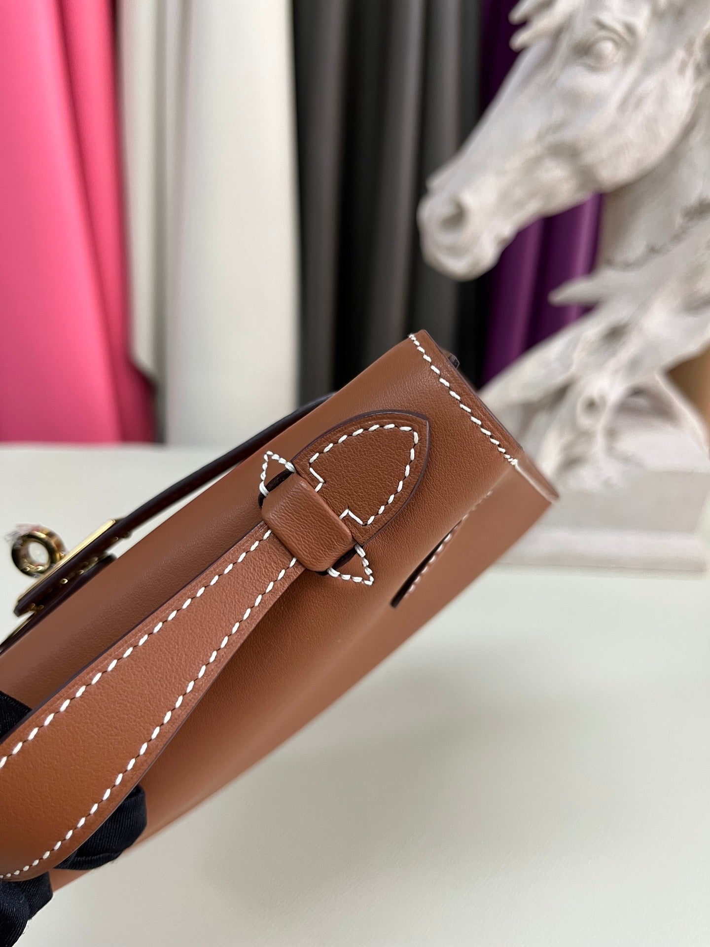 Elegant Pochette Handbag in Smooth Gold Finish