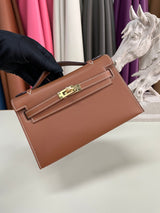 Elegant Pochette Handbag in Smooth Gold Finish