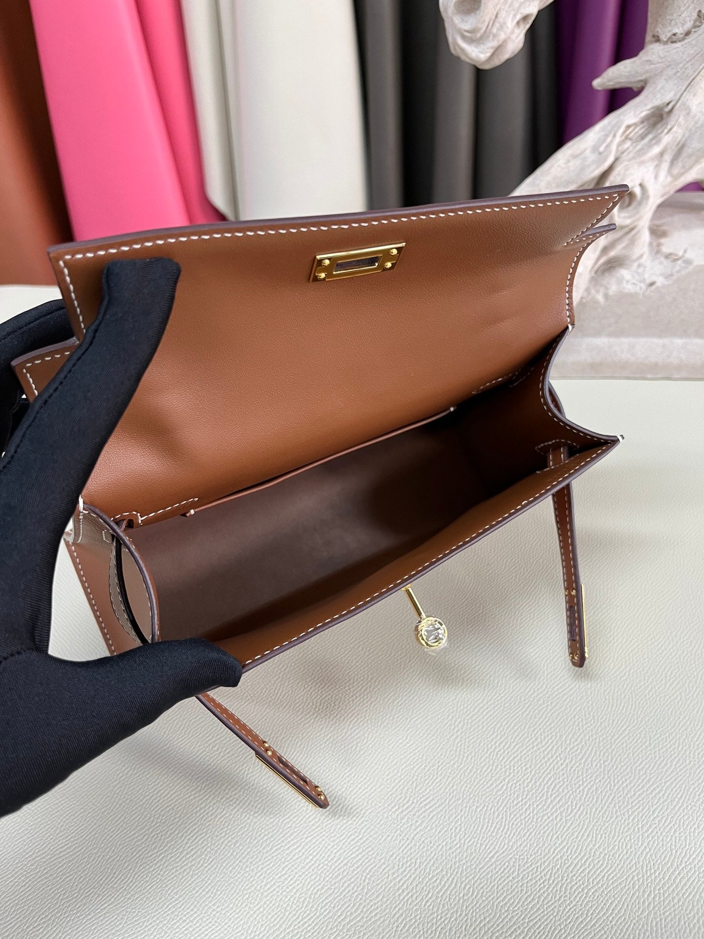 Elegant Pochette Handbag in Smooth Gold Finish