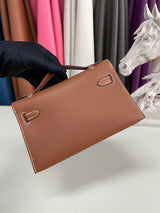 Elegant Pochette Handbag in Smooth Gold Finish