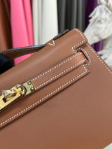 Elegant Pochette Handbag in Smooth Gold Finish