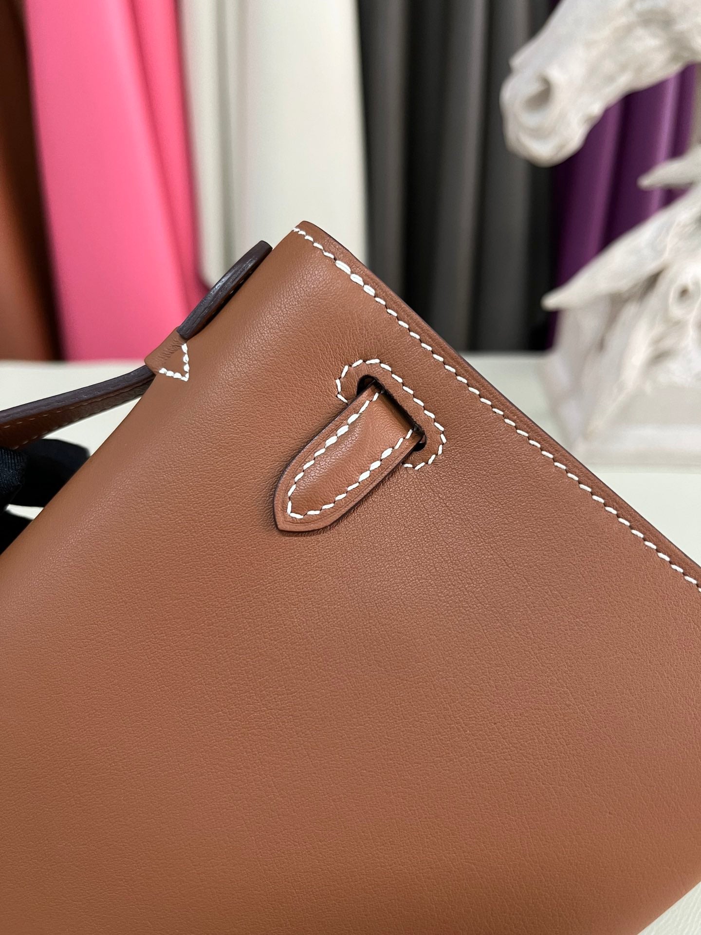 Elegant Pochette Handbag in Smooth Gold Finish