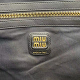 High-Gloss Patent Leather Tote with Metallic Accents