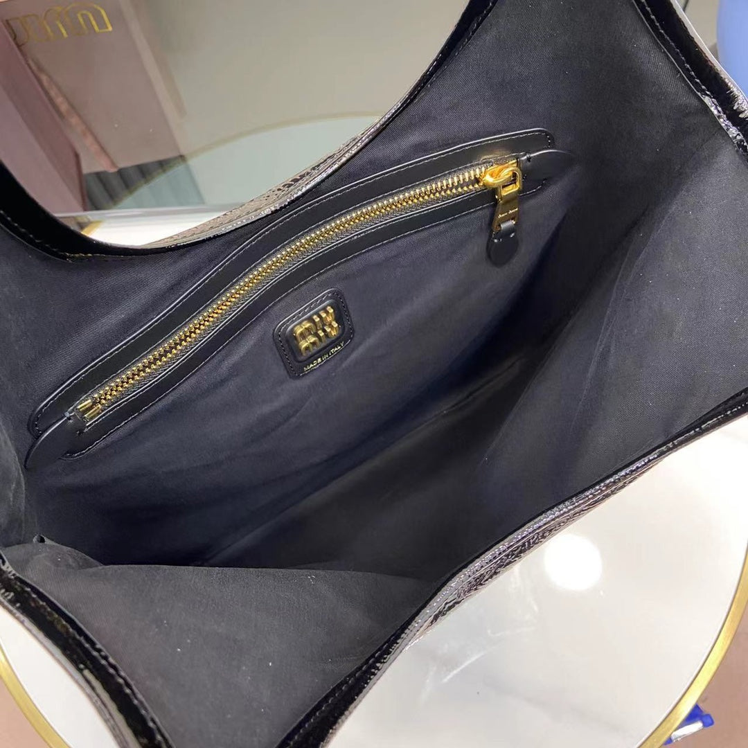 High-Gloss Patent Leather Tote with Metallic Accents