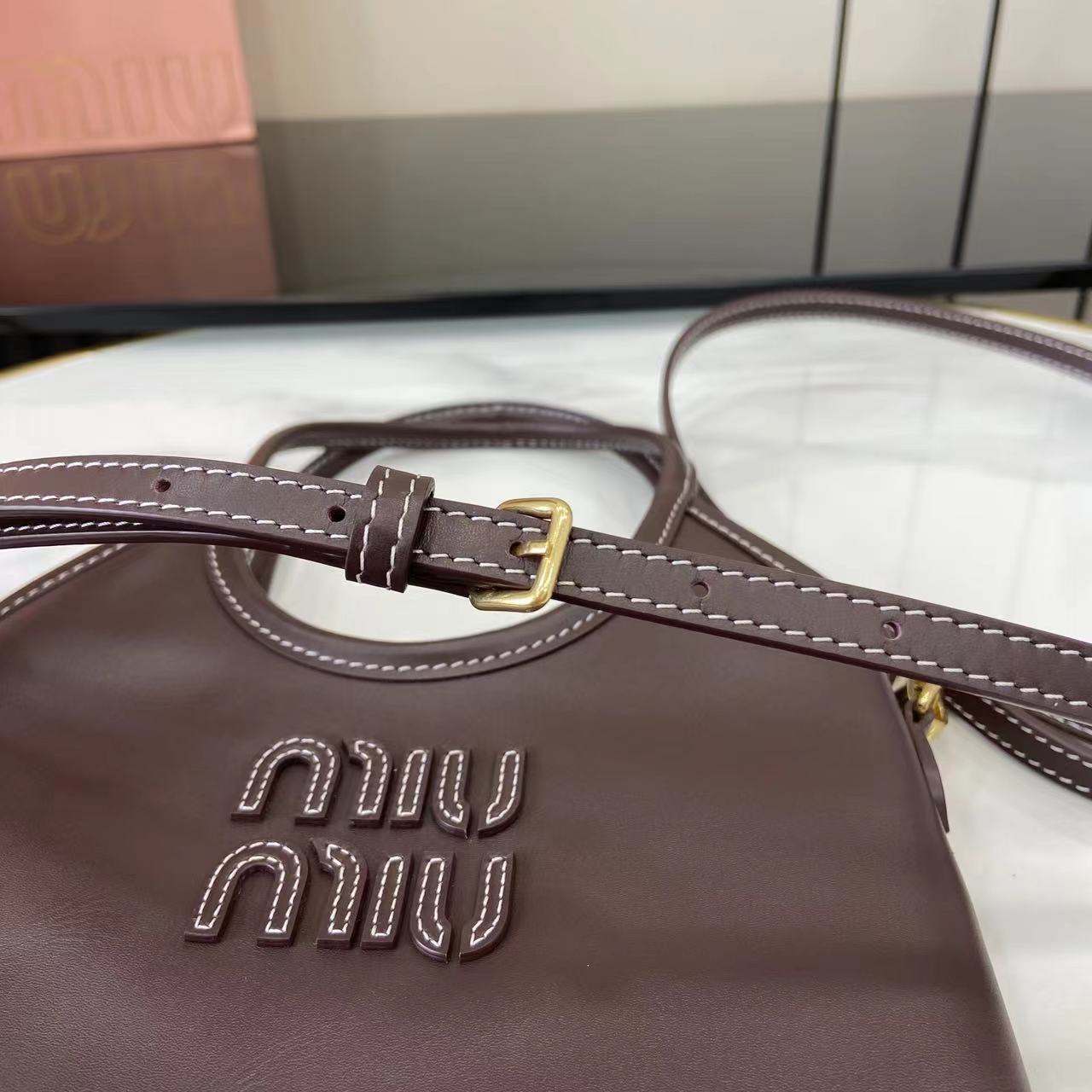 Compact Leather Tote with Classic Detailing