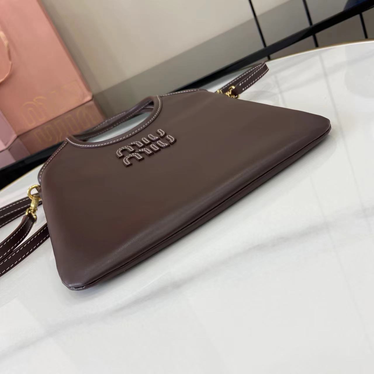 Compact Leather Tote with Classic Detailing