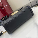 Structured Small Top Handle Bag with Padlock Closure