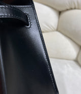 Shine Black Pochette Handbag with Gold-Tone Hardware