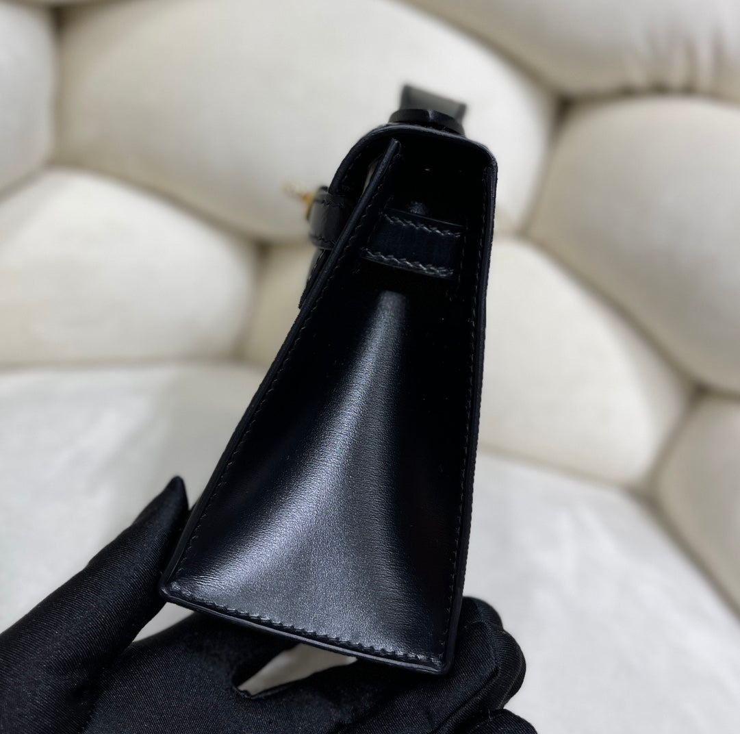 Shine Black Pochette Handbag with Gold-Tone Hardware