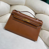 Gold Swift Pochette Handbag with Elegant Gold Hardware