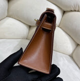 Gold Swift Pochette Handbag with Elegant Gold Hardware