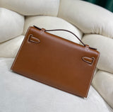 Gold Swift Pochette Handbag with Elegant Gold Hardware