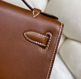 Gold Swift Pochette Handbag with Elegant Gold Hardware