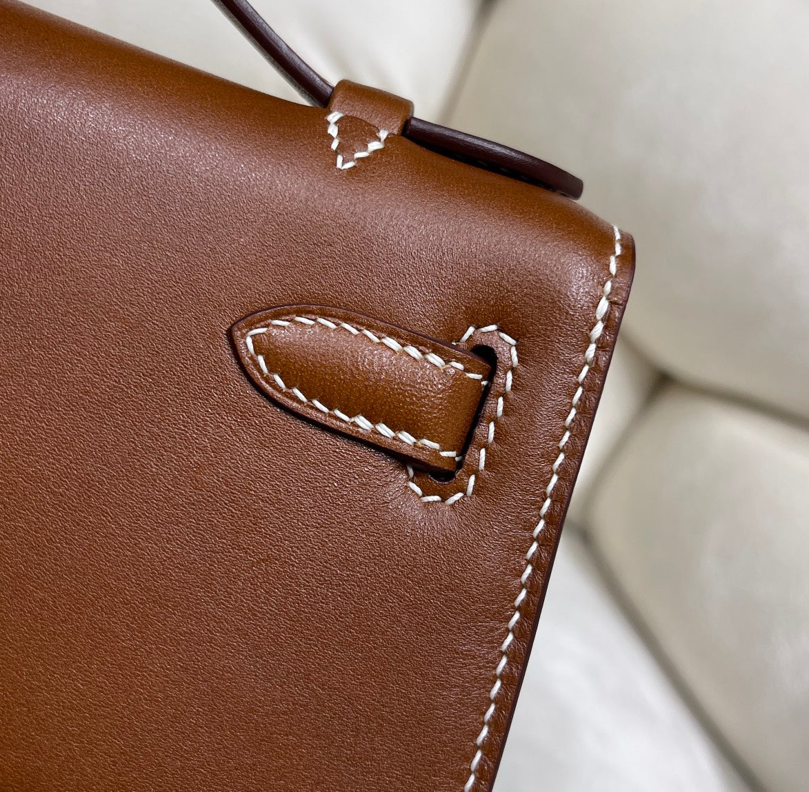 Gold Swift Pochette Handbag with Elegant Gold Hardware