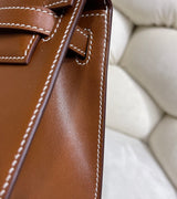 Gold Swift Pochette Handbag with Elegant Gold Hardware